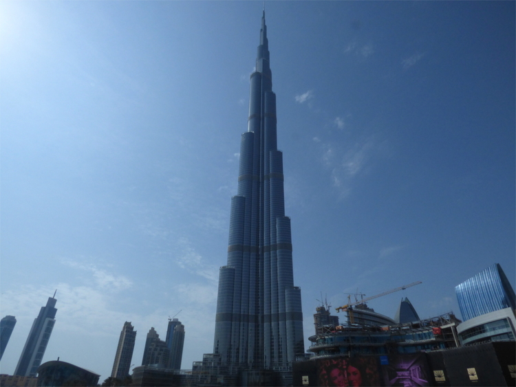 A view of the Burj Khalifa, an extremely tall skyscraper made up of several cylindrical parts growing thinner towards the top