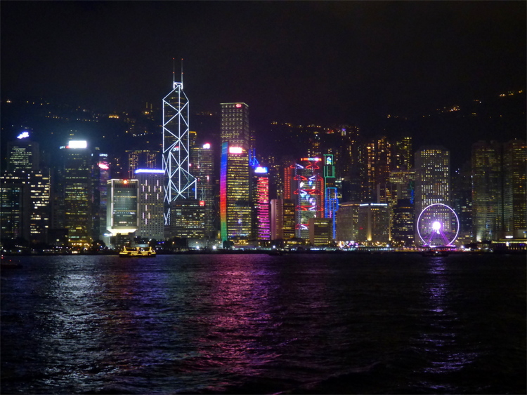 The skyline of Hong Kong lit up in various colours at night